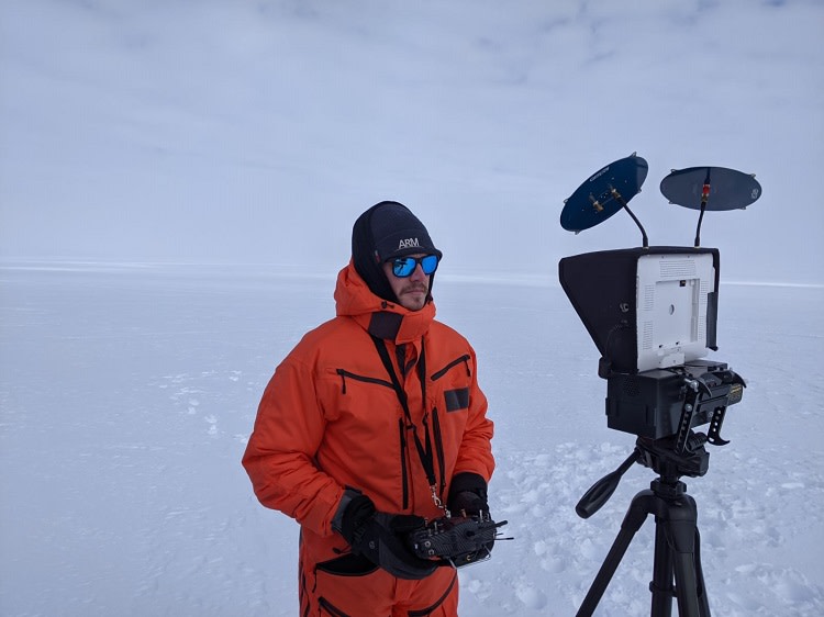Aerosol scientist Matt Boyer piloting fixed wing drones that are used to collect vertically resolved data.