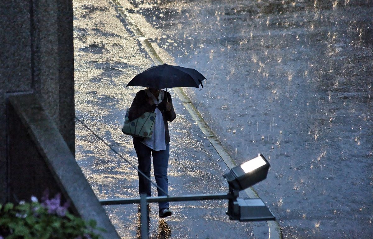 Heavy rain and water over street.