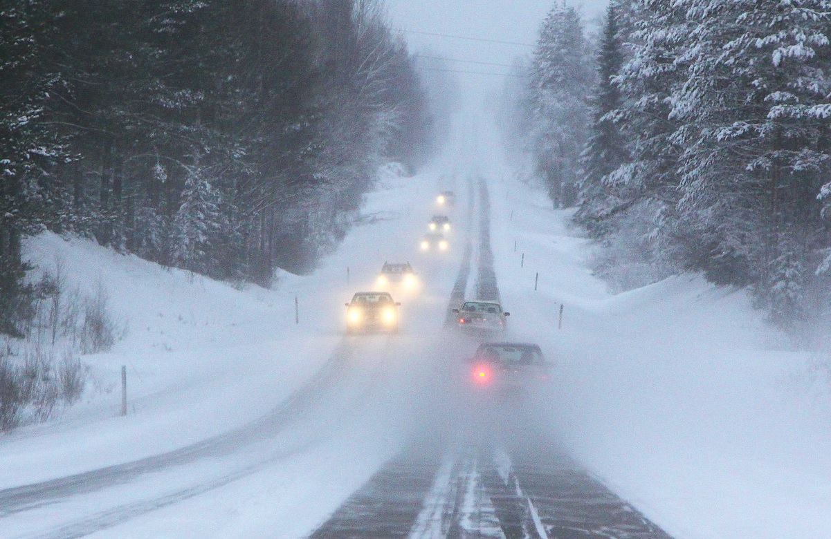 Snowy road and cars.